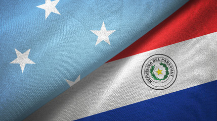 Micronesia and Paraguay two flags textile cloth, fabric texture