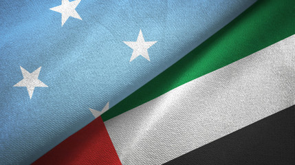 Micronesia and United Arab Emirates two flags textile cloth, fabric texture