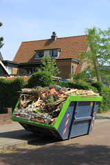 Loaded garbage dumpster - 268243812