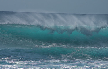 big wave about to break on the beach