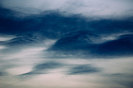Sky background with curious shapes clouds.