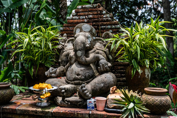 Sculpture of Ganesh with offerings