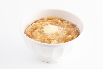 Oatmeal with Butter and Honey on a White Background