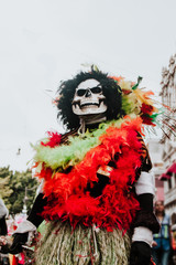 Fototapeta na wymiar skull head costume in mexican carnival in Mexico city