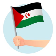 Sahrawi Arab Democratic Republic flag in hand
