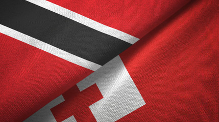 Fototapeta na wymiar Trinidad and Tobago and Tonga two flags textile cloth, fabric texture
