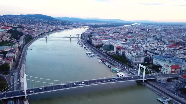 Aerial footage of Budapest, Hungary over the Danube river on a summer's day.
