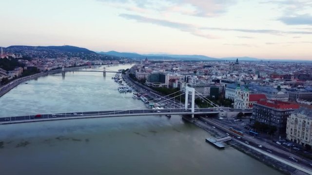 Aerial footage of Budapest, Hungary over the Danube river on a summer's day.
