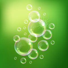 Realistic transparent floating soap bubbles with rainbow reflection. Design element for advertising booklet, flyer or poster