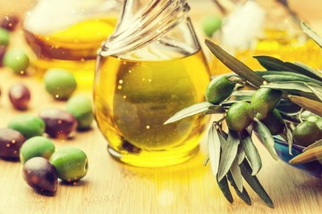 Bottle of Olive Oil with Green and Black Olives