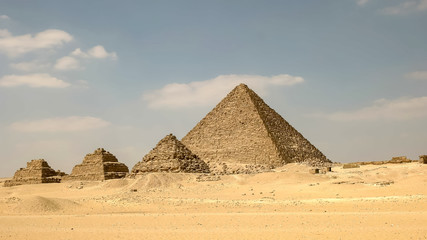 Fototapeta na wymiar low angle shot of pyramids at giza near cairo