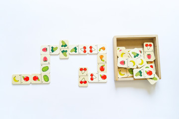 Montessori material for the study of mathematics. Natural material. Dominoes with fruit