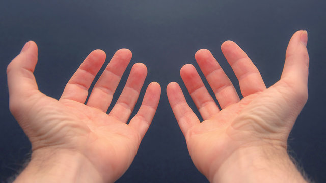 outstretched arms with open palms