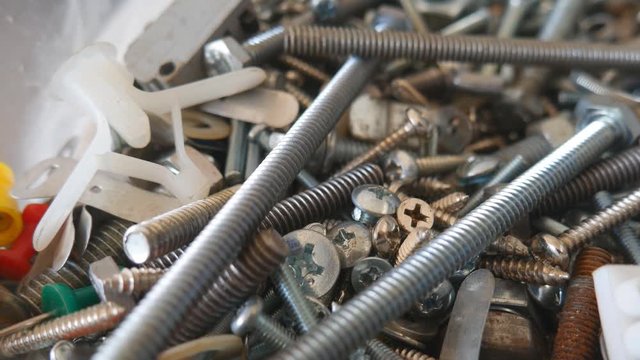Detail of different metallic bolts nuts and screw