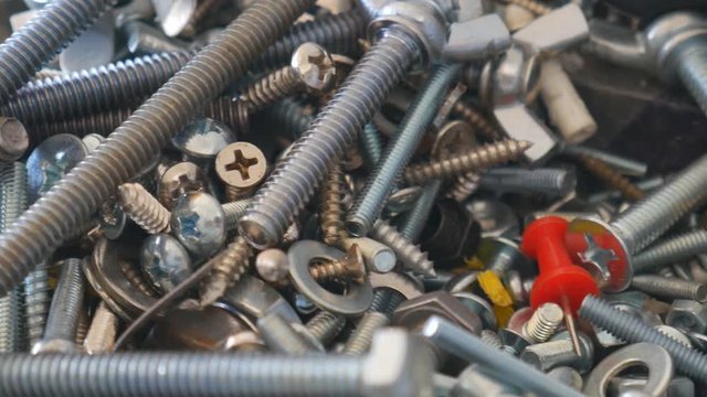Detail of different metallic bolts nuts and screw