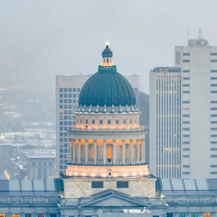 Fototapeta na wymiar Square The magnificent Utah State Capital Building in Salt lake City on a hazy day
