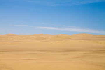 Fototapeta na wymiar View of the Peruvian dunes in the ICA region.