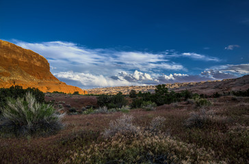A late in the day shot of clouds gathering over the Waterpocket Fold in Capitol Reef National Park.