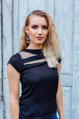 Fototapeta premium Attractive lady with blond hair and bright makeup