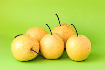 Pear shot against a solid color background