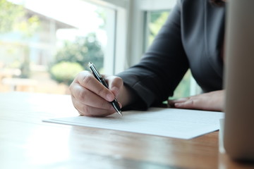 Legal counsel presents to the client a signed contract with gavel and legal law. justice and lawyer...