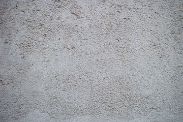 Wall rough plaster texture. Seamless surface texture. Copy place for inscription.