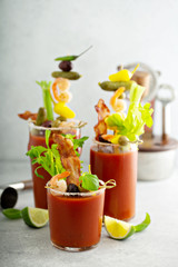 Spicy bacon bloody mary with variety of toppings
