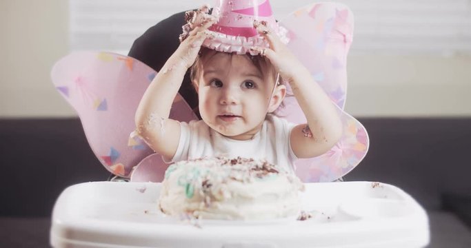 Baby girl celebrates her first birthday. Shot in RAW 4K on a cinema camera.