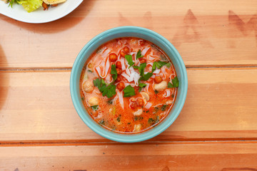 Vegetarian spicy soup with vegetable broth, mushrooms and ribbon noodles