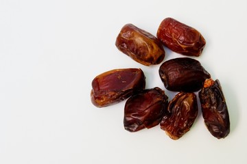 raisins/dates fruit (kurma) on white background