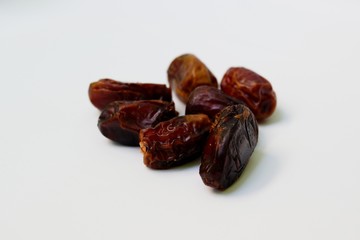 raisins/dates fruit (kurma) on white background