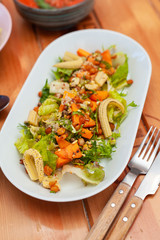 Mixed salad with vegetarian protein: greens, mini-corn, chickpea and quinoa