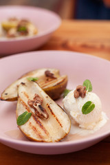 Sweet BBQ dessert: grilled pears with a nice scoop of vanilla ice cream