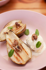 Sweet BBQ dessert: grilled pears with a nice scoop of vanilla ice cream