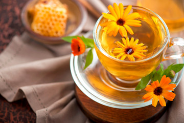 A cup of calendula marigold tea on a table