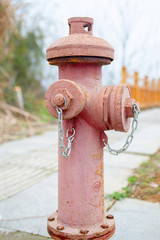 Close up fire hydrant red paint texture
