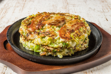 お好み焼き 広島焼き Okonomiyaki is a Japanese-style pancake