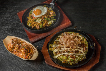 お好み焼き 広島焼き Okonomiyaki is a Japanese-style pancake