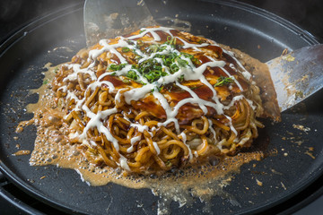 お好み焼き 広島焼き Okonomiyaki is a Japanese-style pancake