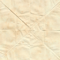 Folded Aged and Stained Paper Background or Overlay