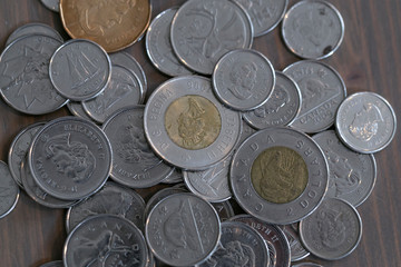 Canadian Coins in pile.