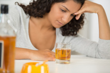 hand a glass of cognac