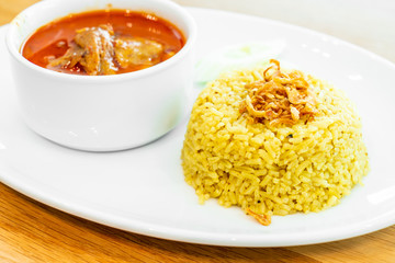 yellow rice with curry chicken mussaman soup