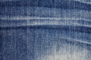 Naklejka premium Jeans torn denim texture background.