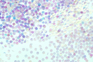 Confetti  on a blue background, festive concept.  Perfect place for your design.