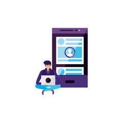 young man using laptop with smartphone