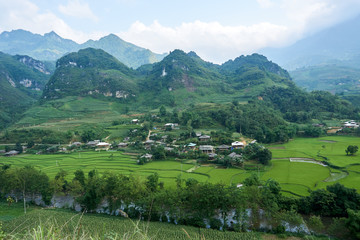Fototapeta na wymiar Rice fields at the Mountain of north Vietnam. Beautiful landscape view on the Ha Giang loop . Motorbike trip