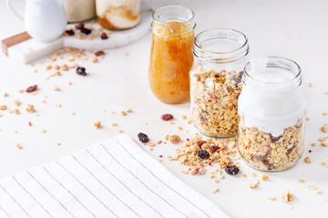 Granola breakfast in glass jars