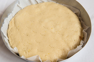 sweet food made from a mixture of flour, shortening, eggs, sugar, and other ingredients, baked and often decorated.