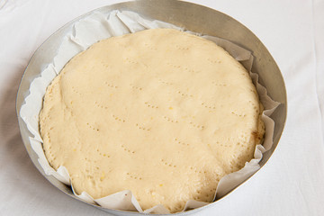 sweet food made from a mixture of flour, shortening, eggs, sugar, and other ingredients, baked and often decorated.